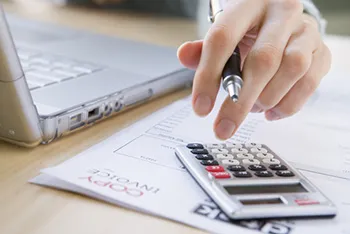 person using calculator